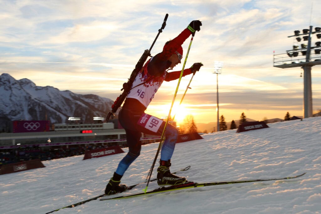 KRASNAJA POLJANA,RUSSLAND,13.FEB.14 - SPORT DIVERS, OLYMPIA, BIATHLON - Olympische Winterspiele Sotschi 2014, Laura Center, Khrebet Psekhako, 20km Einzel der Herren. Bild zeigt Evgeny Ustyugov (RUS).