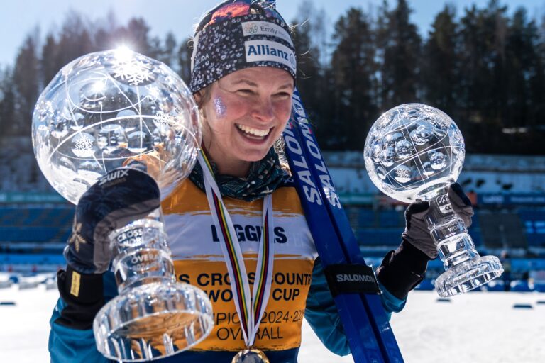 250323 Jessie Diggins of United States celebrates winning the women’s Distance World Cup and the overall women’s World Cup after the women's classic technique 50 km mass start during the FIS Cross-Country World Cup on March 23, 2025 in Lahtis.
